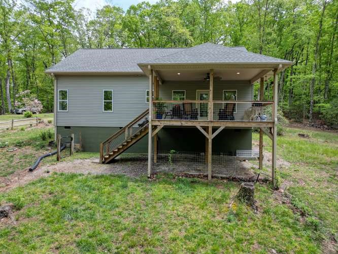 478 Flat Top Road Young Harris, GA 30582 - Photo 13 of 75 a view of a house with backyard porch and sitting area