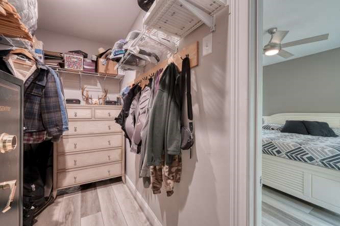 478 Flat Top Road Young Harris, GA 30582 - Photo 34 of 75 a view of walk in closet with clothes and shoes