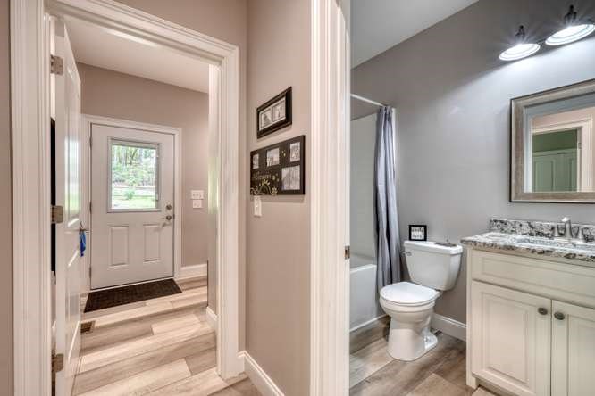 478 Flat Top Road Young Harris, GA 30582 - Photo 45 of 75 a bathroom with a toilet sink and shower