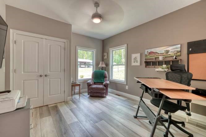 478 Flat Top Road Young Harris, GA 30582 - Photo 48 of 75 a view of a livingroom with furniture window and wooden floor