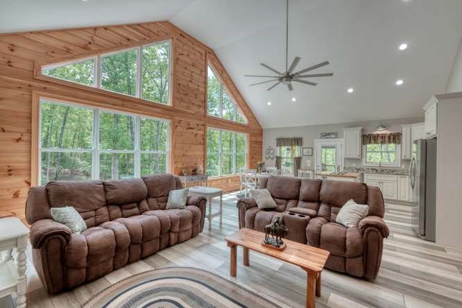478 Flat Top Road Young Harris, GA 30582 - Photo 52 of 75 a living room with furniture and a large window