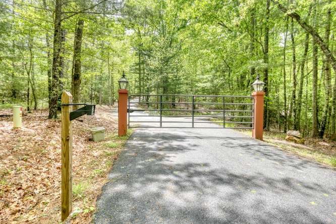 478 Flat Top Road Young Harris, GA 30582 - Photo 9 of 75 a view of a yard with large trees