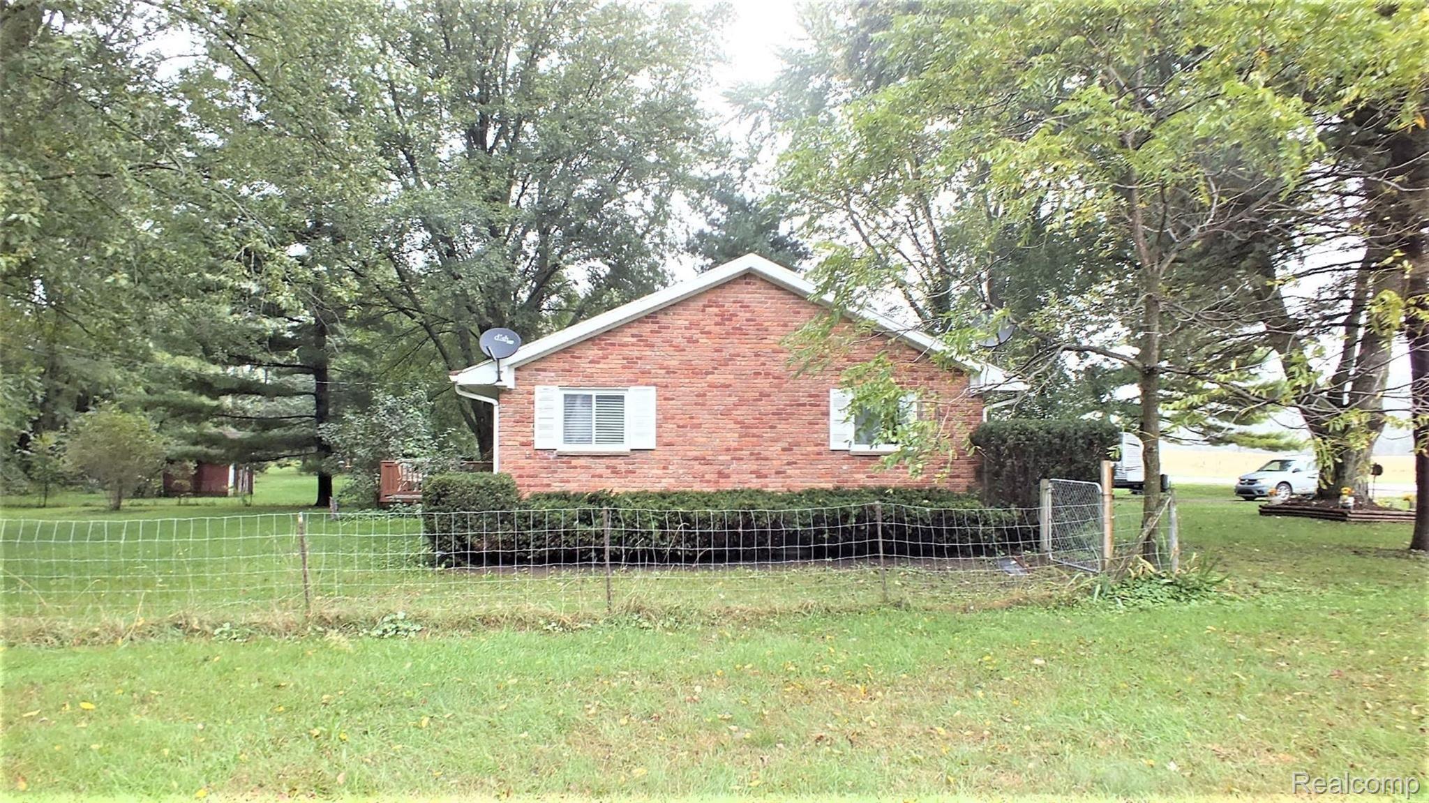 5381 Oak Grove Road Howell, MI 48855 - Photo 4 of 19 side.JPG