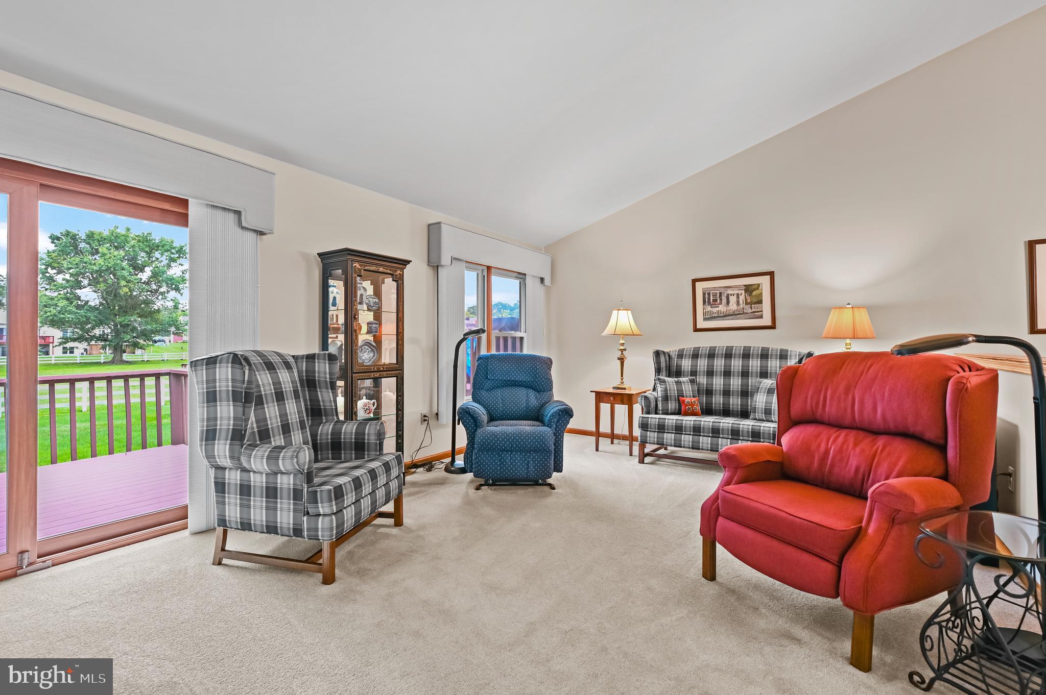 127 Derby Drive Elverson, PA 19520 - Photo 15 of 28 Living room with patio doors to deck