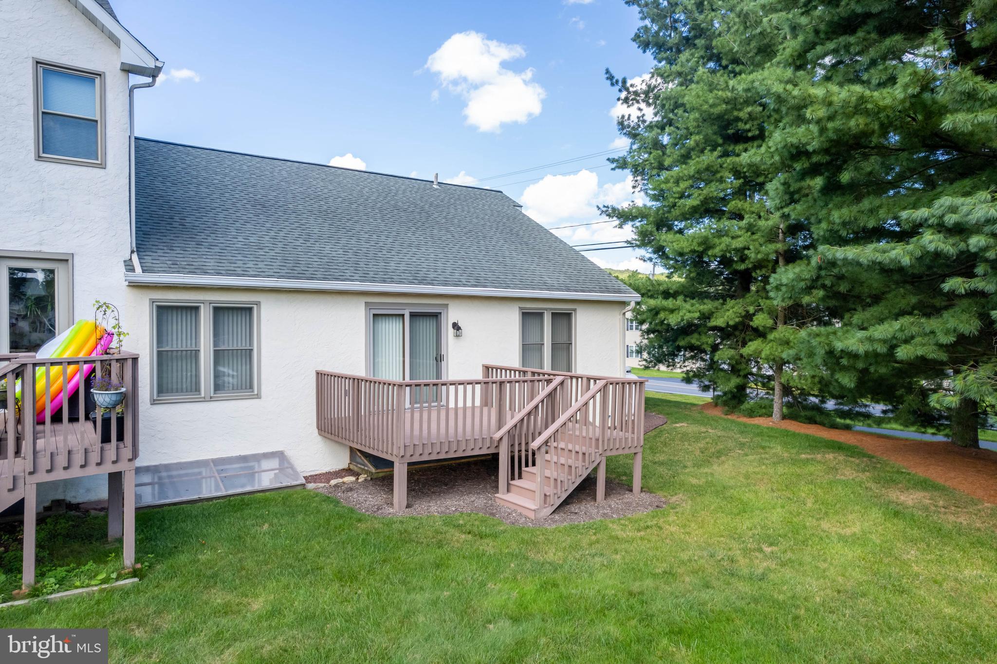 127 Derby Drive Elverson, PA 19520 - Photo 23 of 28 Rear deck with steps to grade