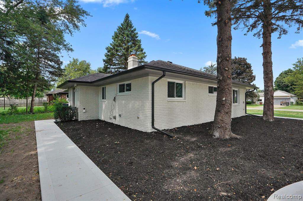 8820 Russell Street Utica, MI 48317 - Photo 23 of 23 Concrete side to back