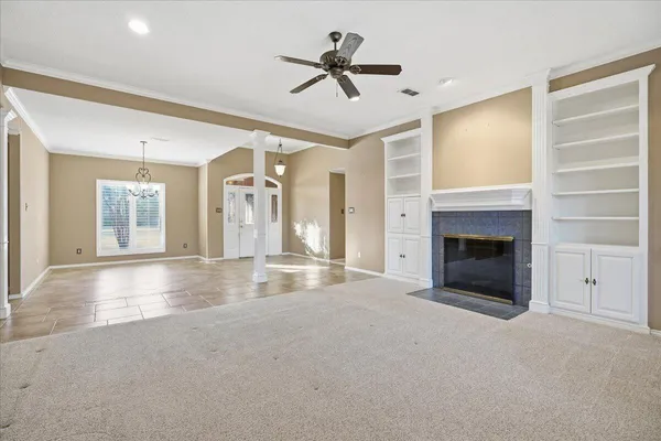 a kitchen with a sink and a refrigerator