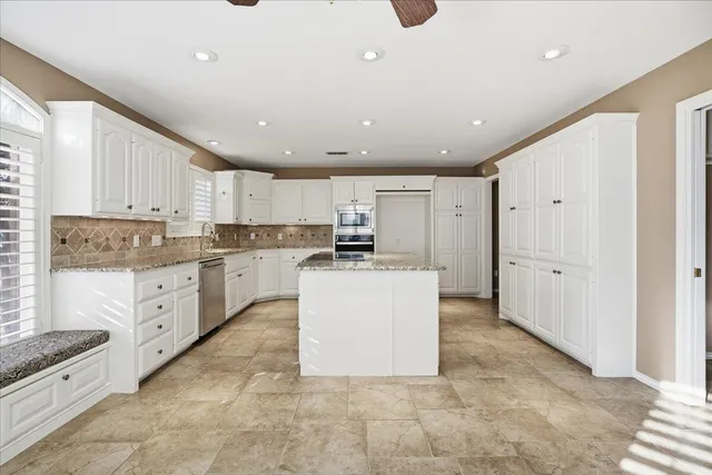 a view of a hallway with closet