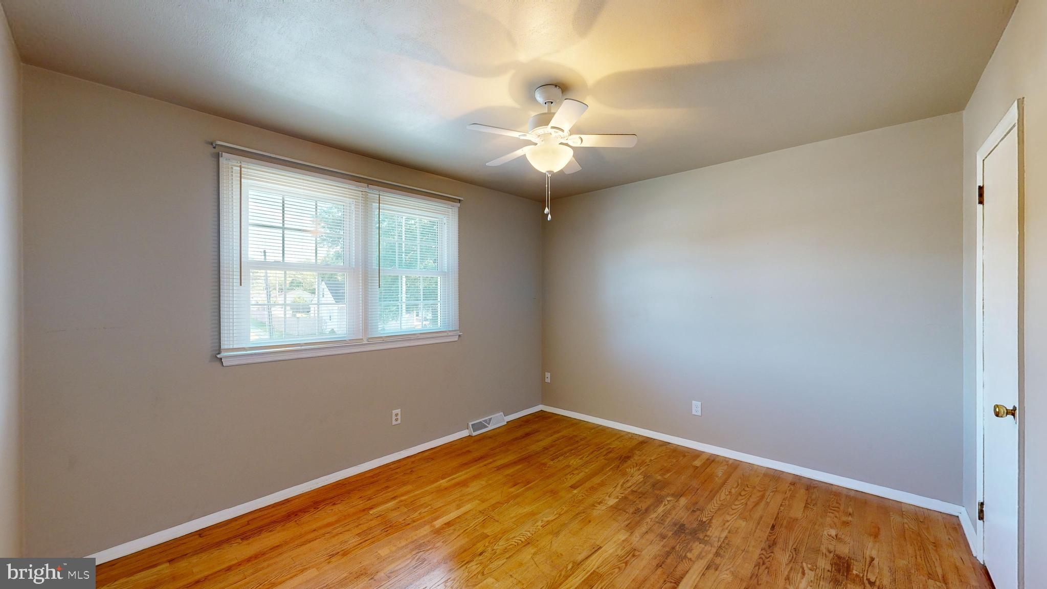 1101 White Oak Road Dover, DE 19901 - Photo 19 of 36 a view of an empty room with a window