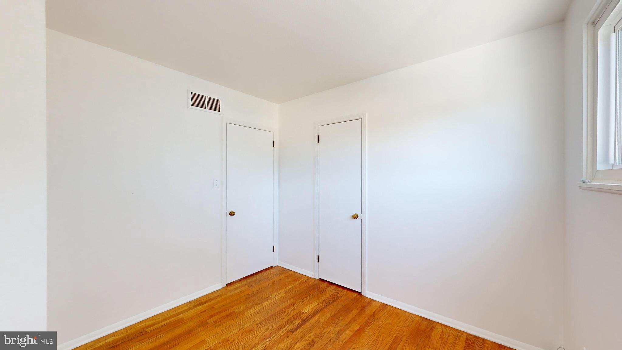 1101 White Oak Road Dover, DE 19901 - Photo 26 of 36 a view of empty room with wooden floor