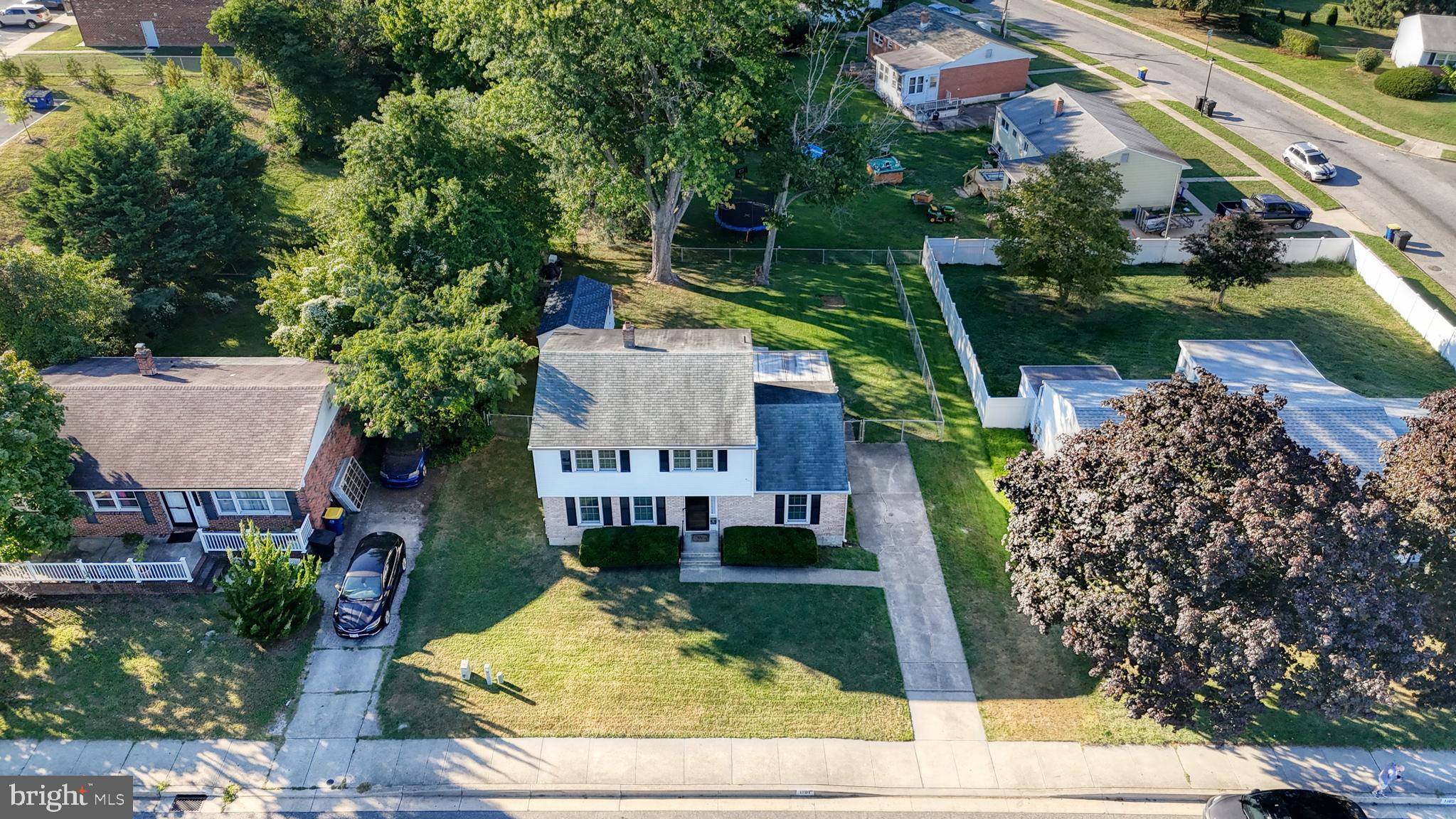 1101 White Oak Road Dover, DE 19901 - Photo 30 of 36 a view of a house with a yard and potted plants
