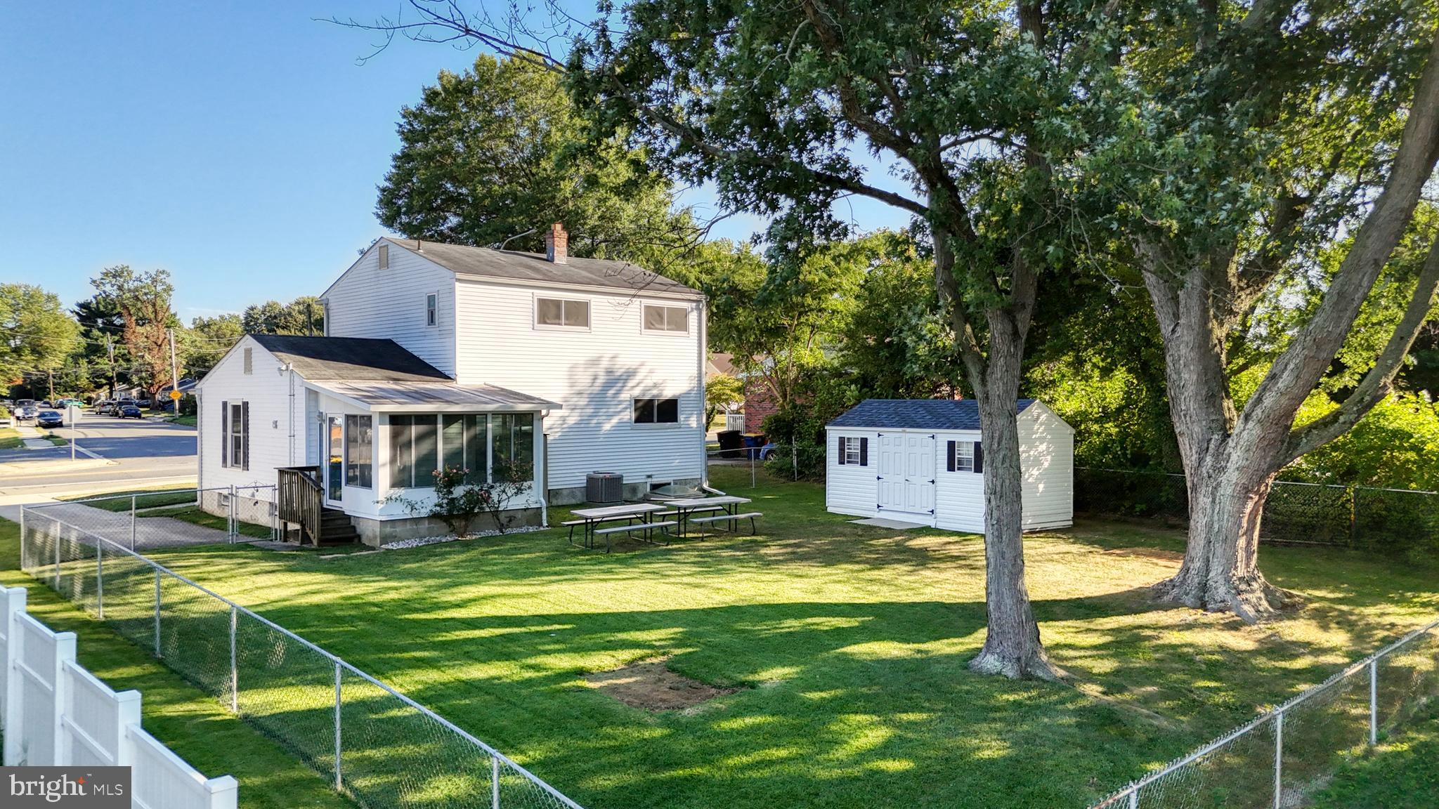 1101 White Oak Road Dover, DE 19901 - Photo 32 of 36 a front view of house with yard and swimming pool