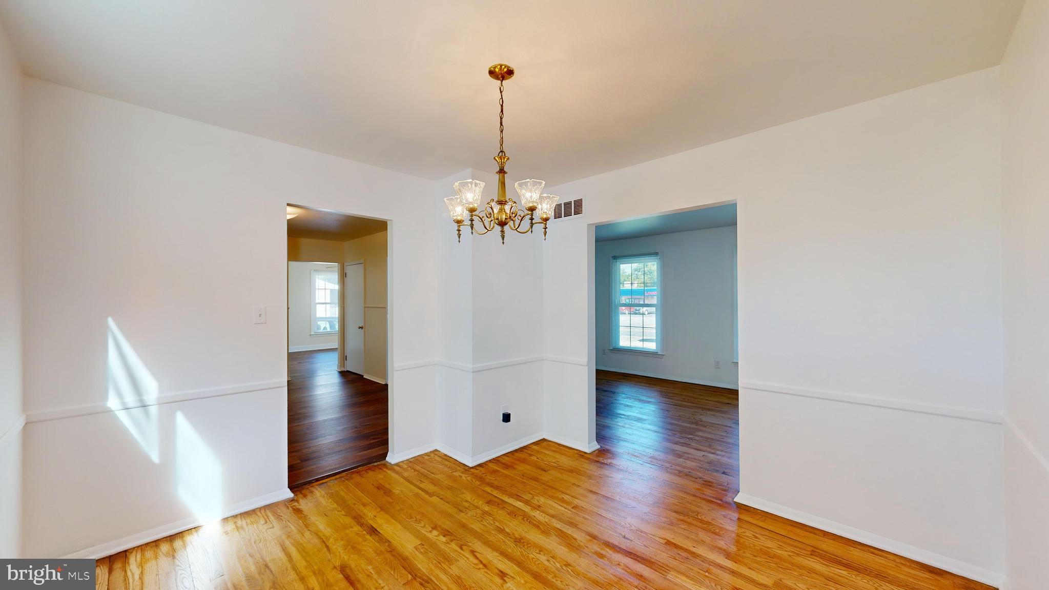 1101 White Oak Road Dover, DE 19901 - Photo 8 of 36 a view of a room with window and wooden floor