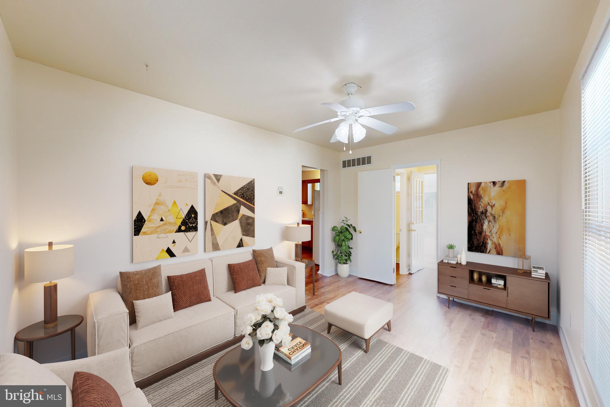 1101 White Oak Road Dover, DE 19901 - Photo 9 of 36 a living room with furniture and wooden floor
