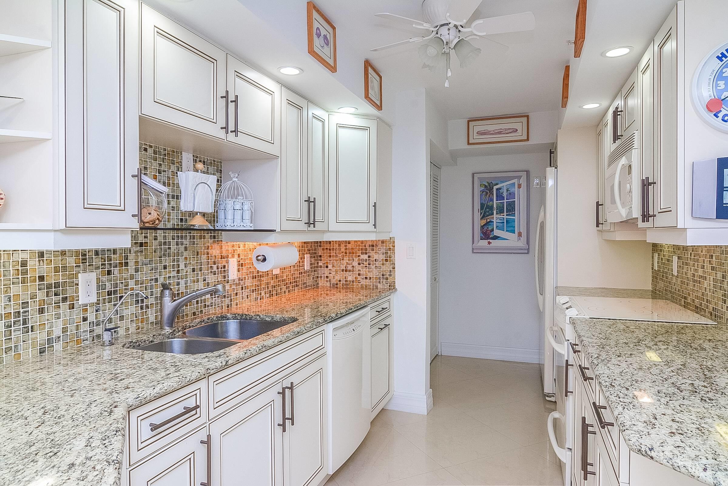 3000 North Ocean Drive, Unit PHF Riviera Beach, FL 33404 - Photo 8 of 43 Kitchen Cabinetry and Counters