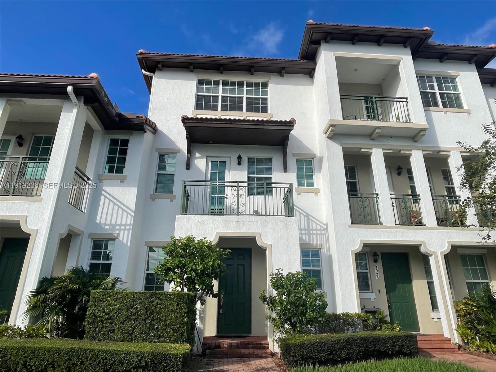 2929 Southwest 119th Way, Unit 2929 Miramar, FL 33025 - Photo 1 of 28 Nicely Manicured Entrance to Townhouse
