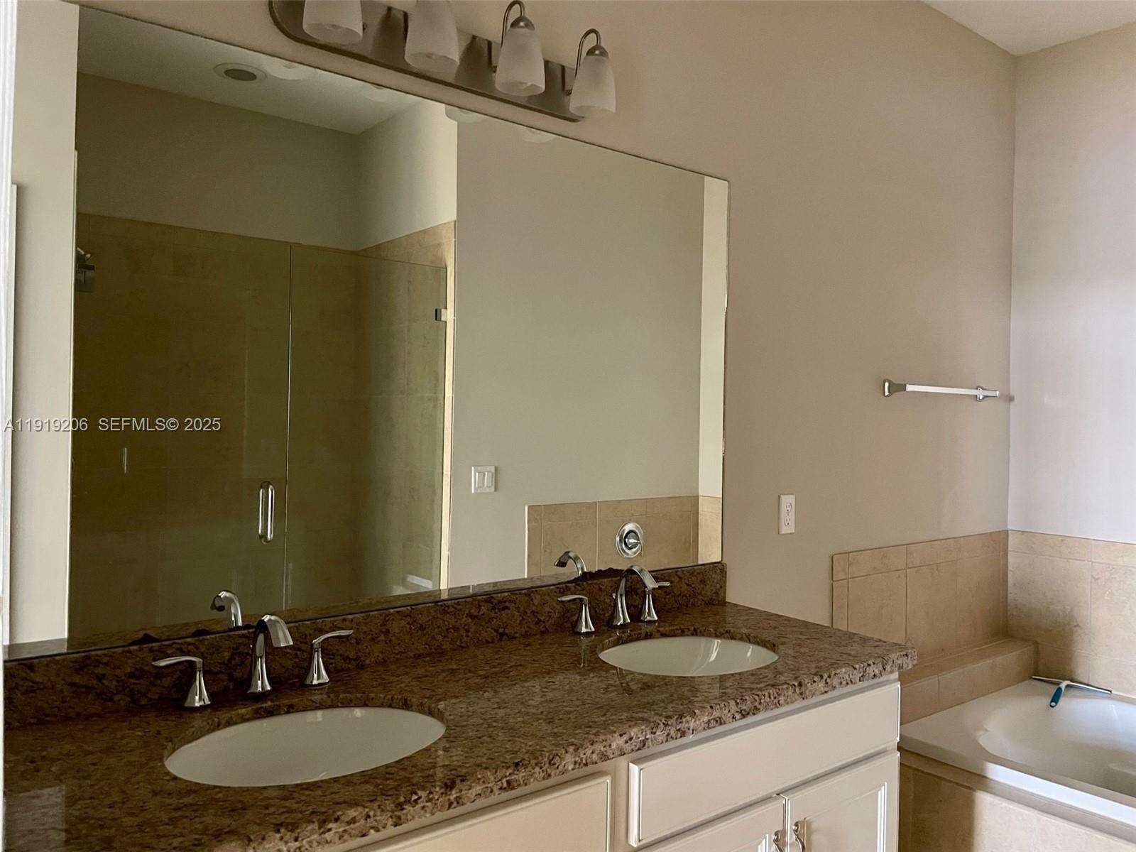 2929 Southwest 119th Way, Unit 2929 Miramar, FL 33025 - Photo 16 of 28 Master Bathroom with Double Basins