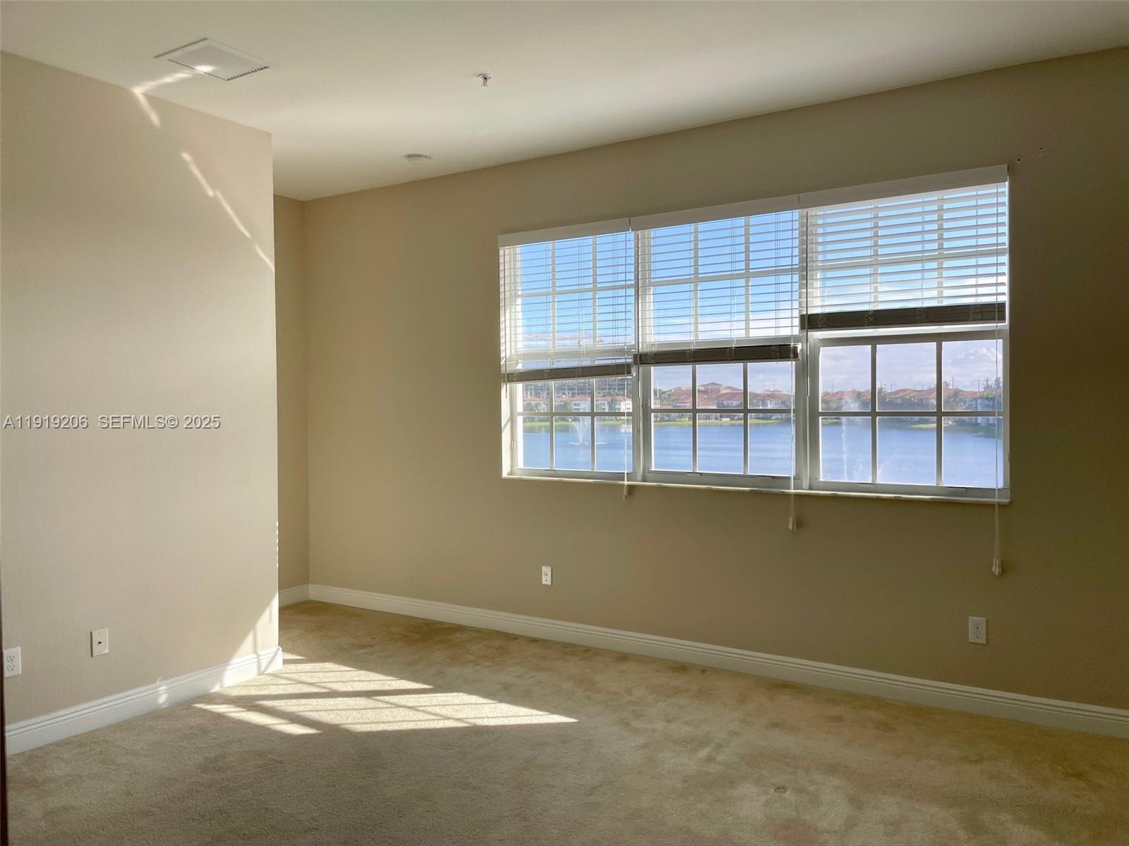 2929 Southwest 119th Way, Unit 2929 Miramar, FL 33025 - Photo 19 of 28 Master Bedroom with Great Lake View