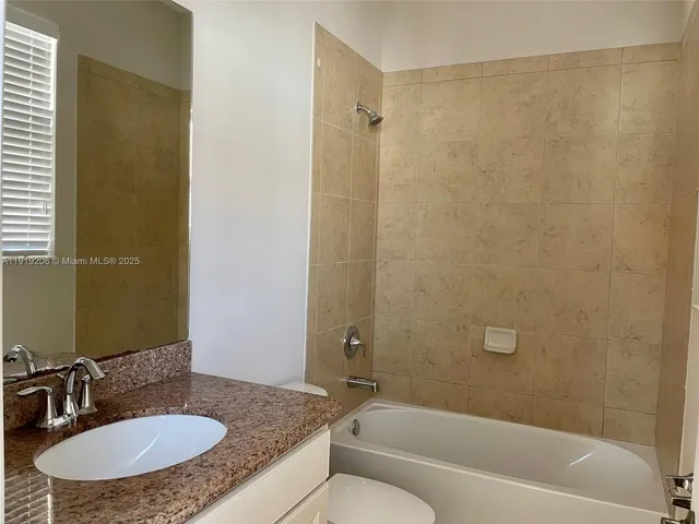 a room with water heater and racks