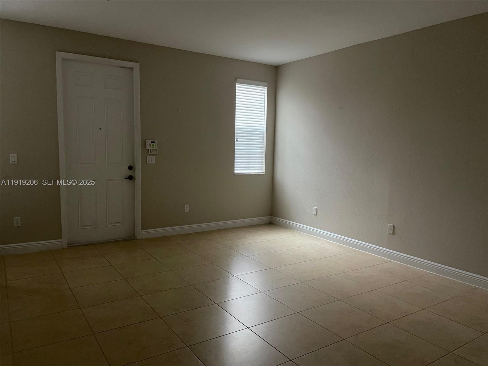 2929 Southwest 119th Way, Unit 2929 Miramar, FL 33025 - Photo 3 of 28 Front Door to 1st Floor Living Area
