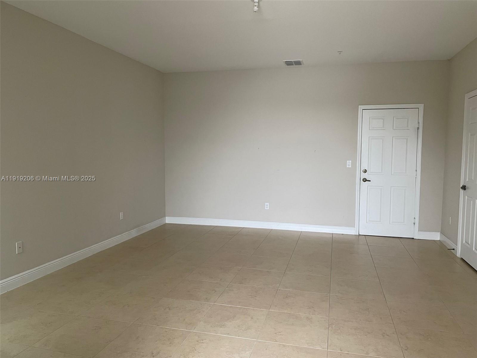 2929 Southwest 119th Way, Unit 2929 Miramar, FL 33025 - Photo 5 of 26 a view of an empty room