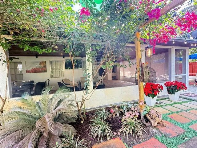 a view of outdoor sitting area with furniture