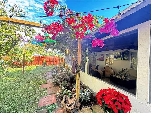 a front view of a house with yard