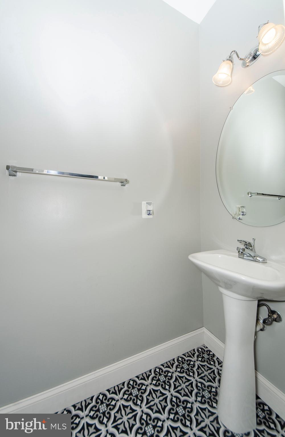 8069 Gatehouse Road, Unit 23 Falls Church, VA 22042 - Photo 13 of 45 Powder room on main level
