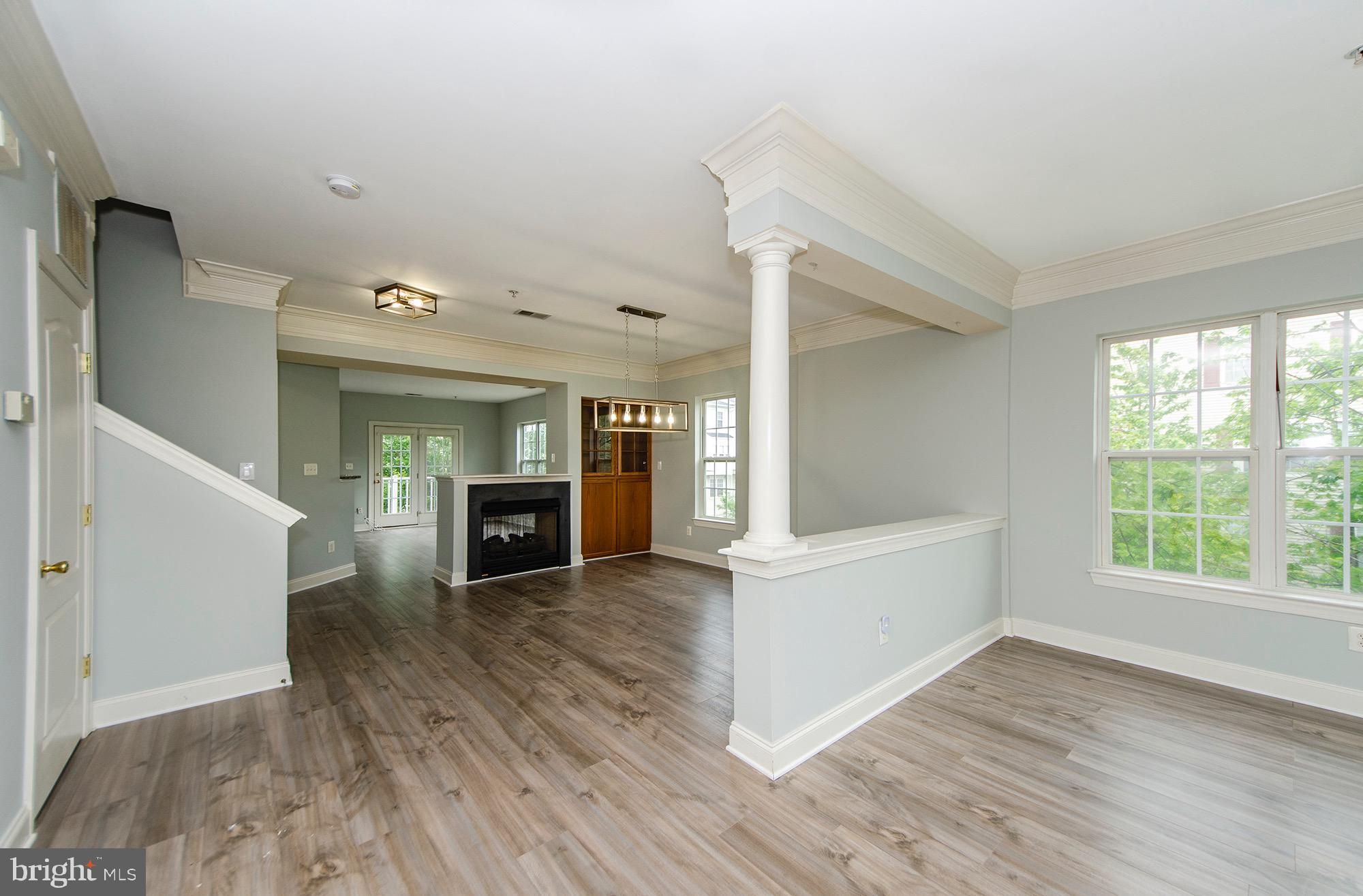 8069 Gatehouse Road, Unit 23 Falls Church, VA 22042 - Photo 14 of 45 Living room looking into dining room