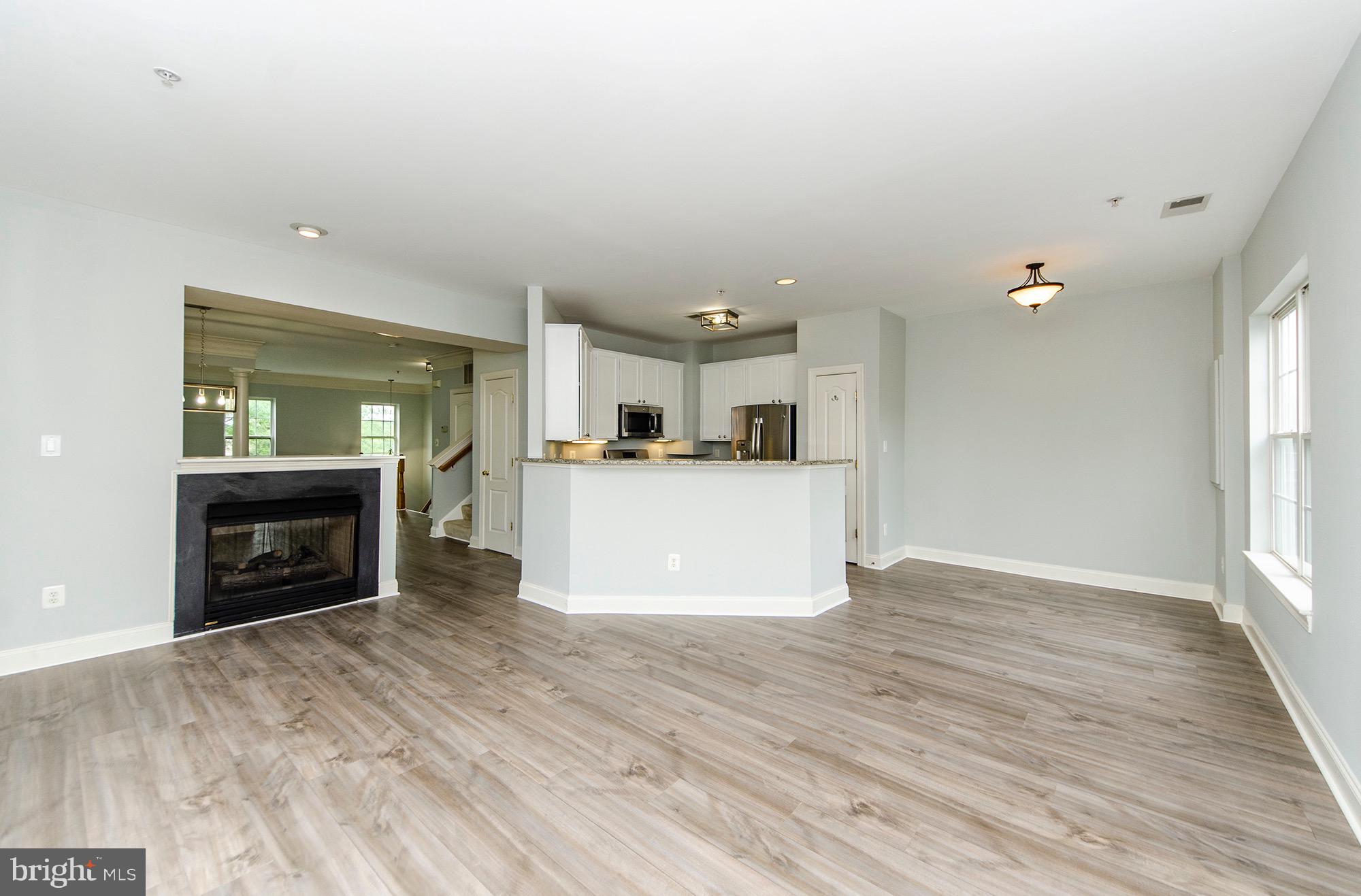 8069 Gatehouse Road, Unit 23 Falls Church, VA 22042 - Photo 17 of 45 Family room looking into kitchen