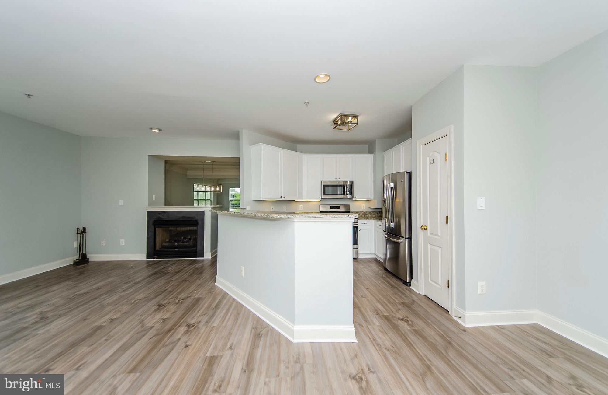 8069 Gatehouse Road, Unit 23 Falls Church, VA 22042 - Photo 22 of 45 Kitchen and family room