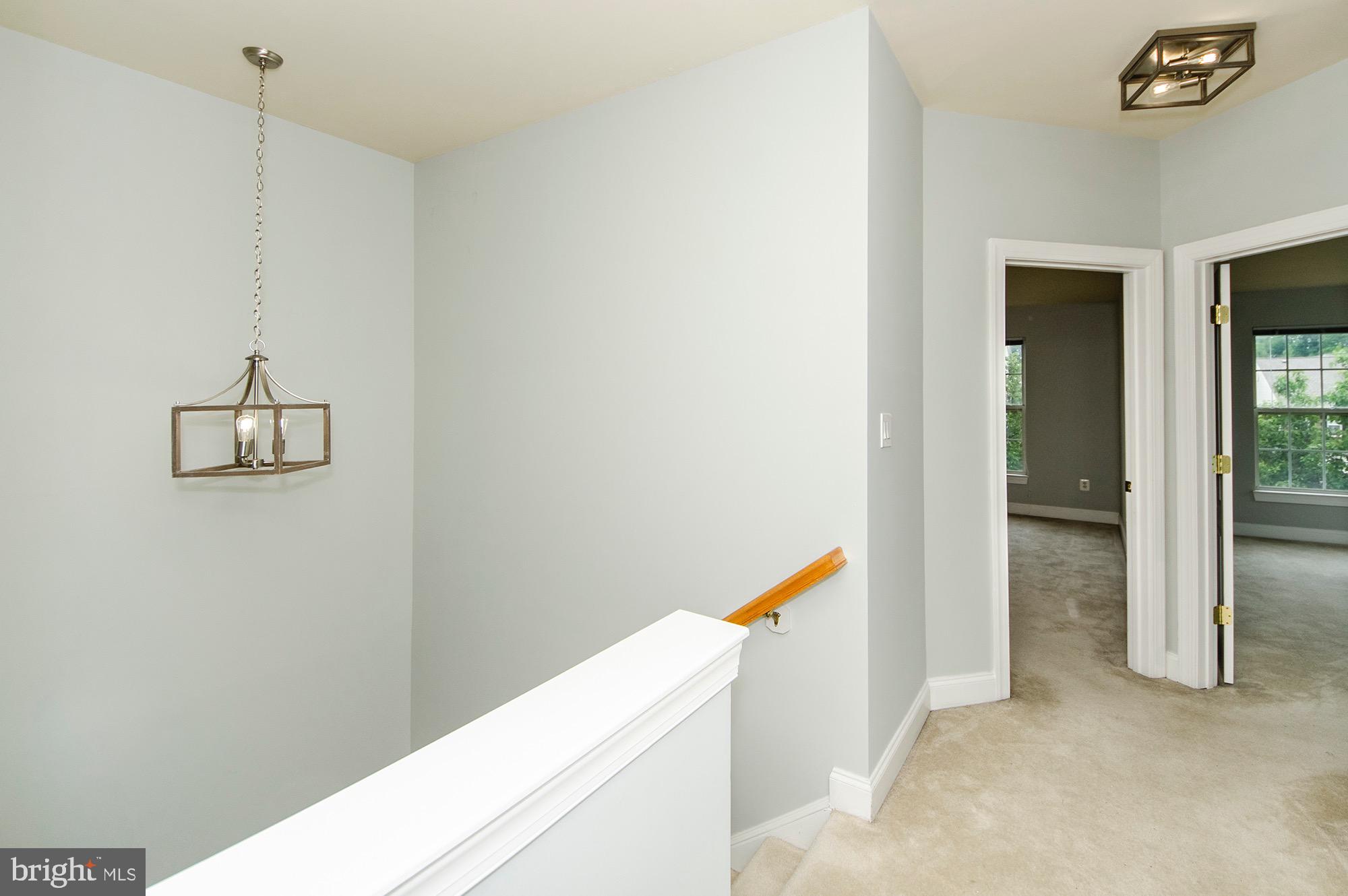 8069 Gatehouse Road, Unit 23 Falls Church, VA 22042 - Photo 30 of 45 Upper level hallway