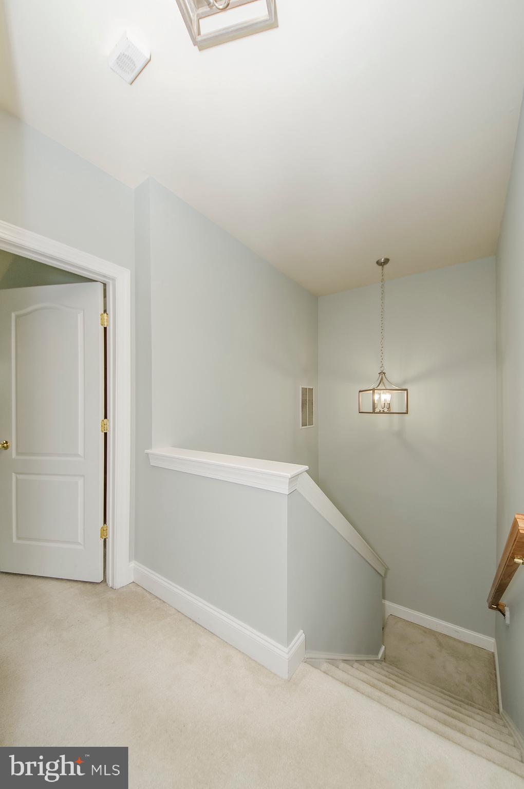 8069 Gatehouse Road, Unit 23 Falls Church, VA 22042 - Photo 31 of 45 Hallway to primary bedroom