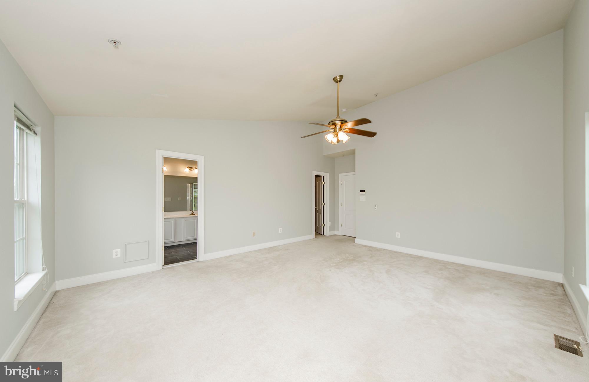 8069 Gatehouse Road, Unit 23 Falls Church, VA 22042 - Photo 32 of 45 Primary bedroom w/ vaulted ceilings