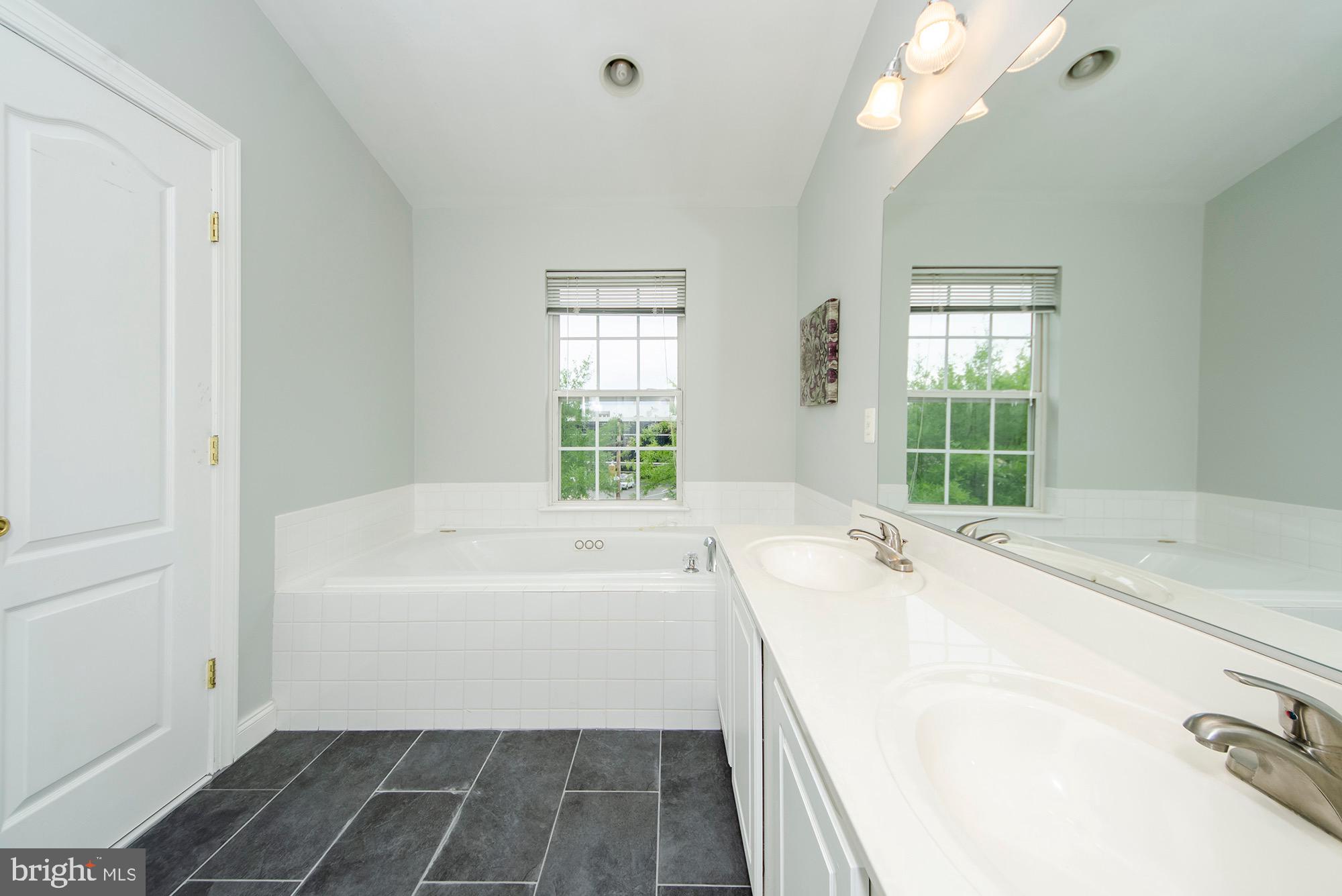 8069 Gatehouse Road, Unit 23 Falls Church, VA 22042 - Photo 36 of 45 Primary bath w/ double vanity