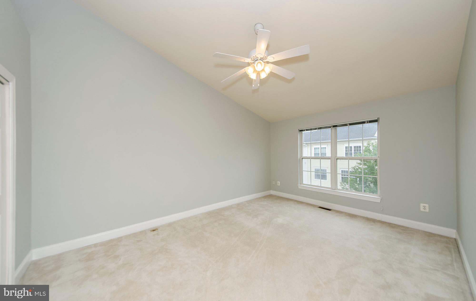 8069 Gatehouse Road, Unit 23 Falls Church, VA 22042 - Photo 41 of 45 2nd bedroom upper level w/ vaulted ceilings
