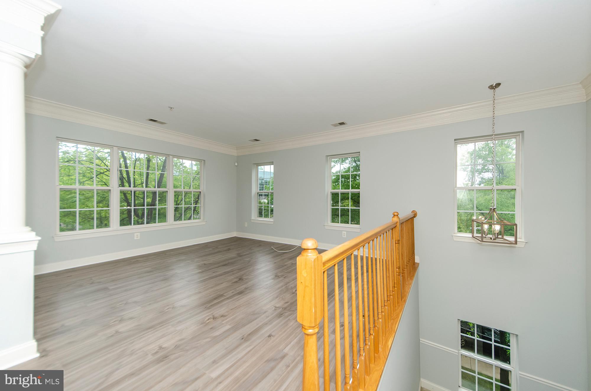 8069 Gatehouse Road, Unit 23 Falls Church, VA 22042 - Photo 9 of 45 Living room - end unit gives so many extra windows