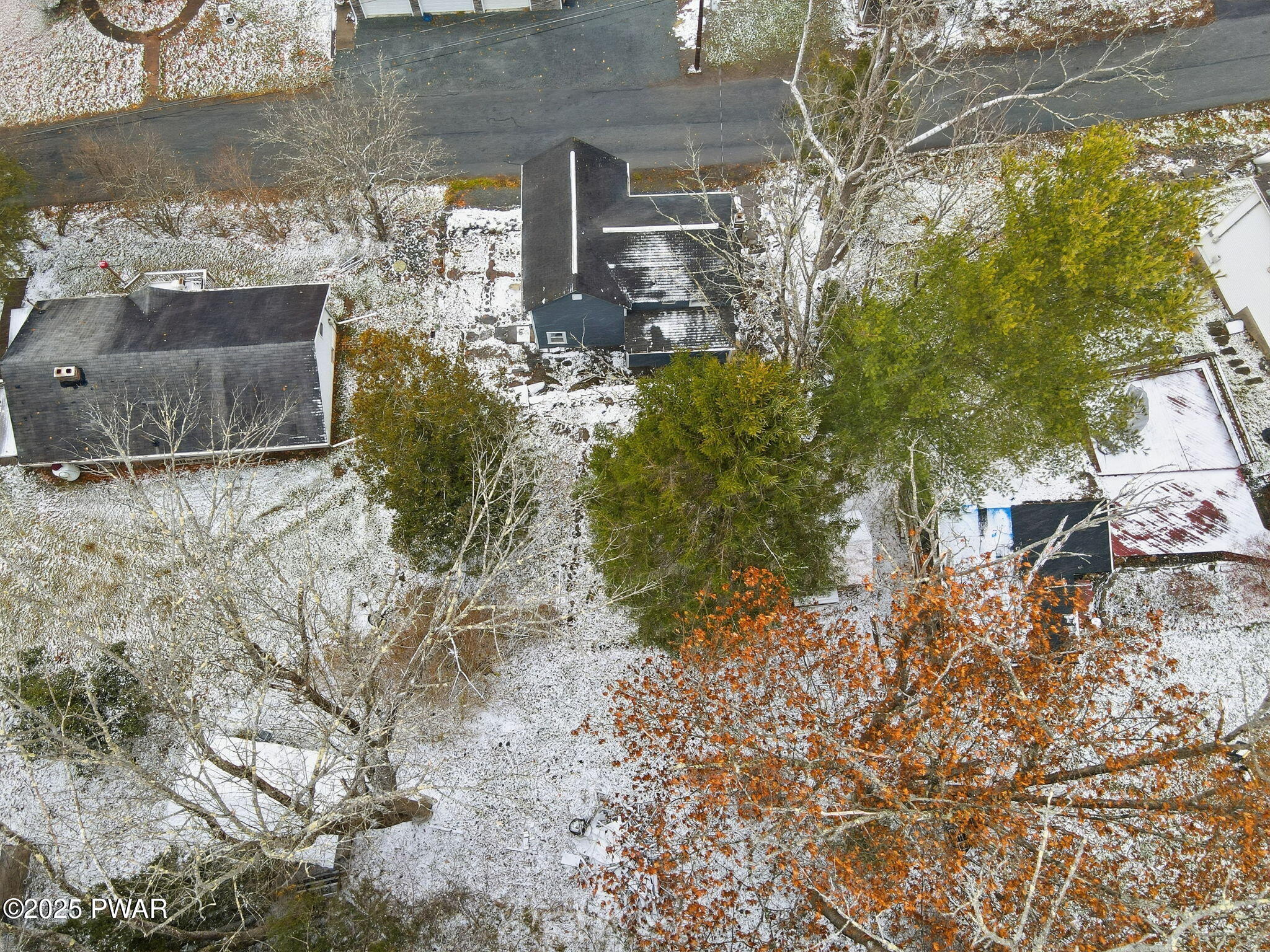 74 Charles Street Hawley, PA 18428 - Photo 39 of 40 a view of a house with a yard