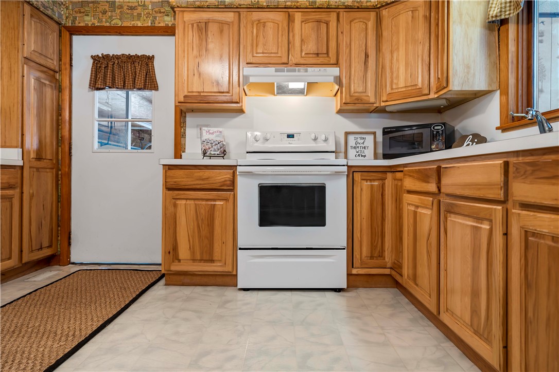 121 Cuddeback Road Phelps, NY 14532 - Photo 7 of 43 Enter from the garage