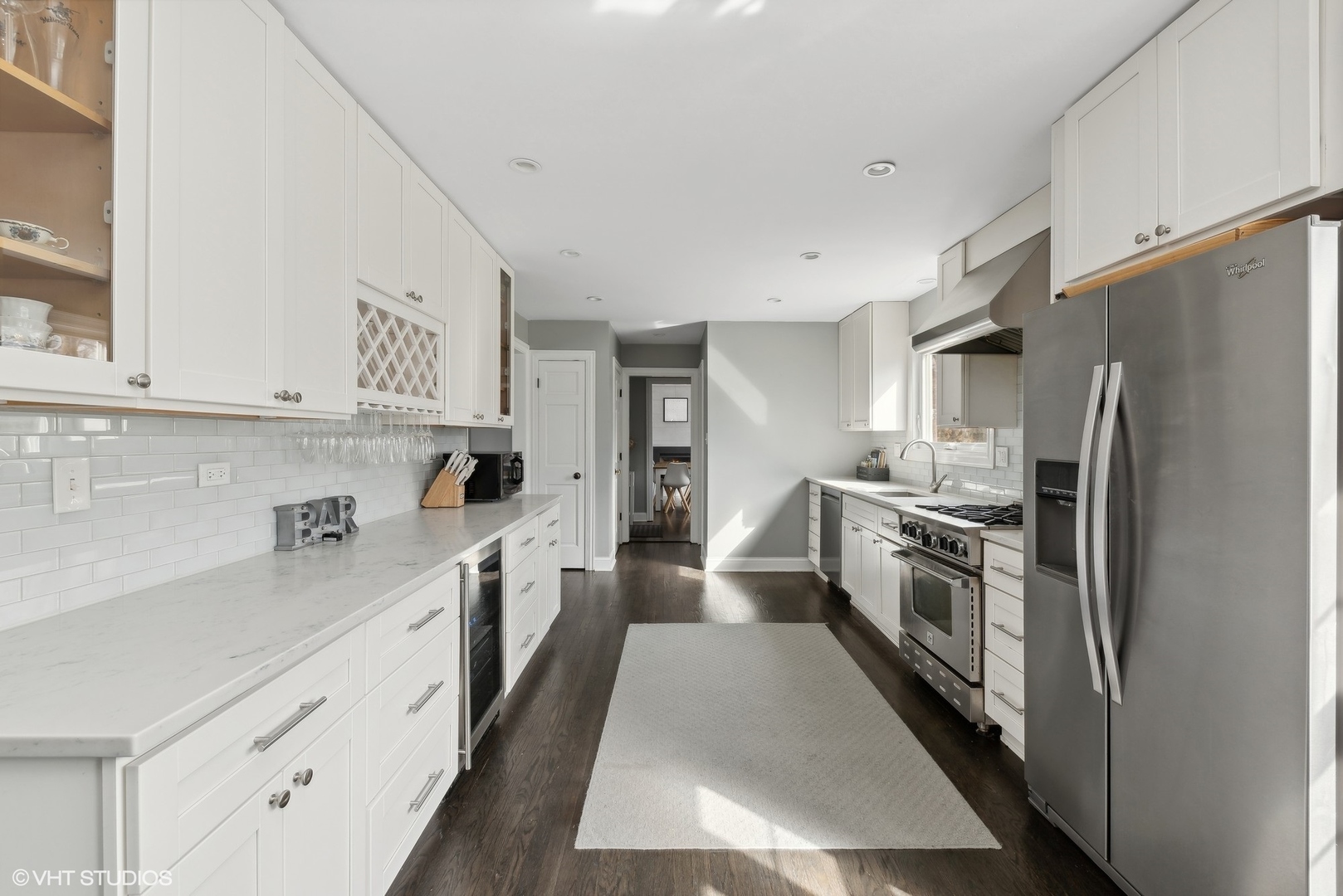 811 East Talbot Street Arlington Heights, IL 60004 - Photo 5 of 27 a large kitchen with stainless steel appliances granite countertop a lot of counter space and a refrigerator