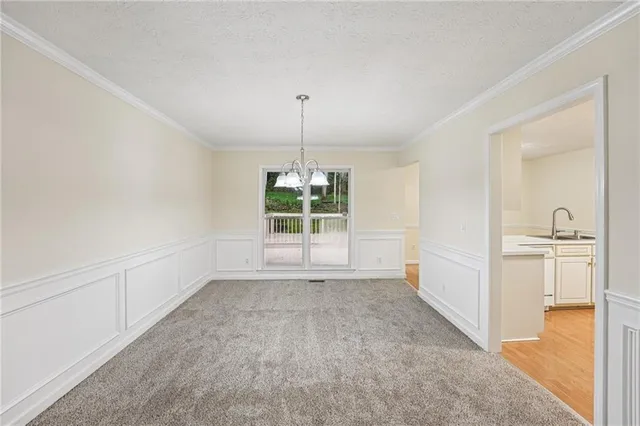 a view of a room with a sink and a window