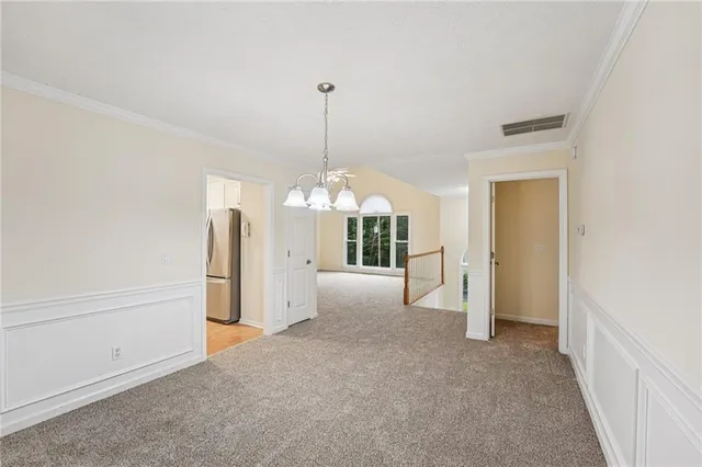 a view of a room with a chandelier