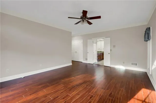 a kitchen with a stove a refrigerator and a sink