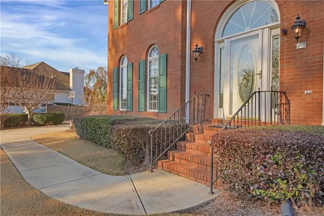 a view of an empty room with a fireplace