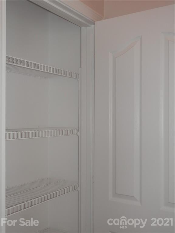 5057 Prosperity Church Road Charlotte, NC 28269 - Photo 12 of 24 a close up view of a shower