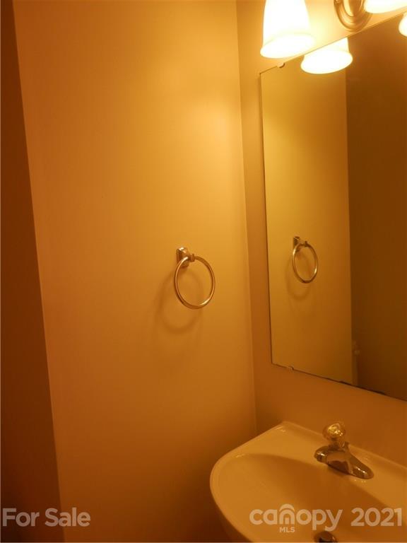 5057 Prosperity Church Road Charlotte, NC 28269 - Photo 13 of 24 a bathroom with a shower