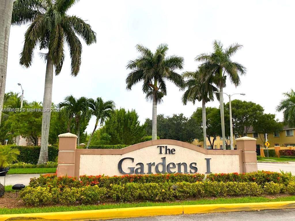 2621 Southeast 12th Road, Unit 106 Homestead, FL 33035 - Photo 4 of 4 a sign board with palm trees