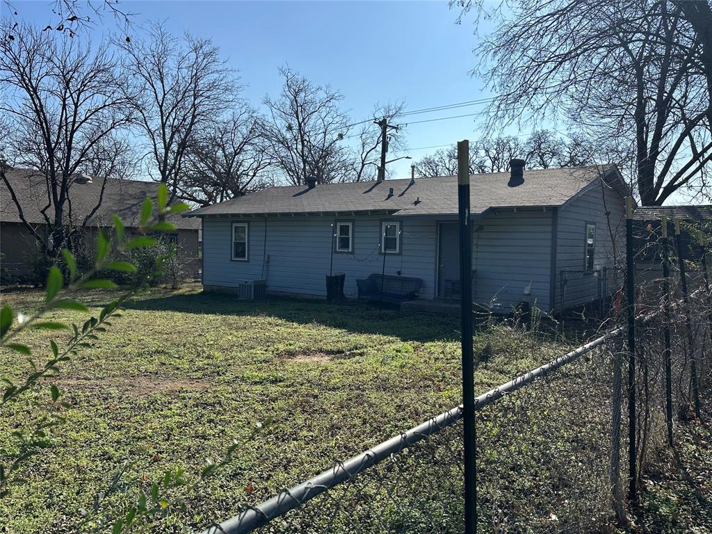 1709 Lattimore Street Denton, TX 76209 - Photo 16 of 23 a house view with a backyard space