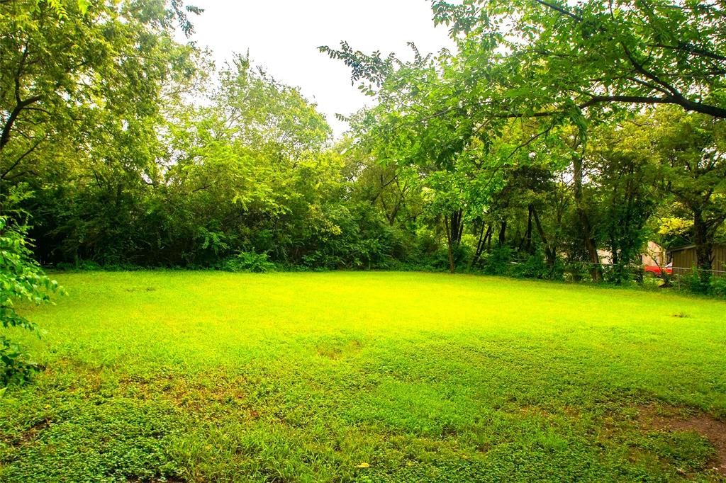 1709 Lattimore Street Denton, TX 76209 - Photo 17 of 23 a view of a field with a trees