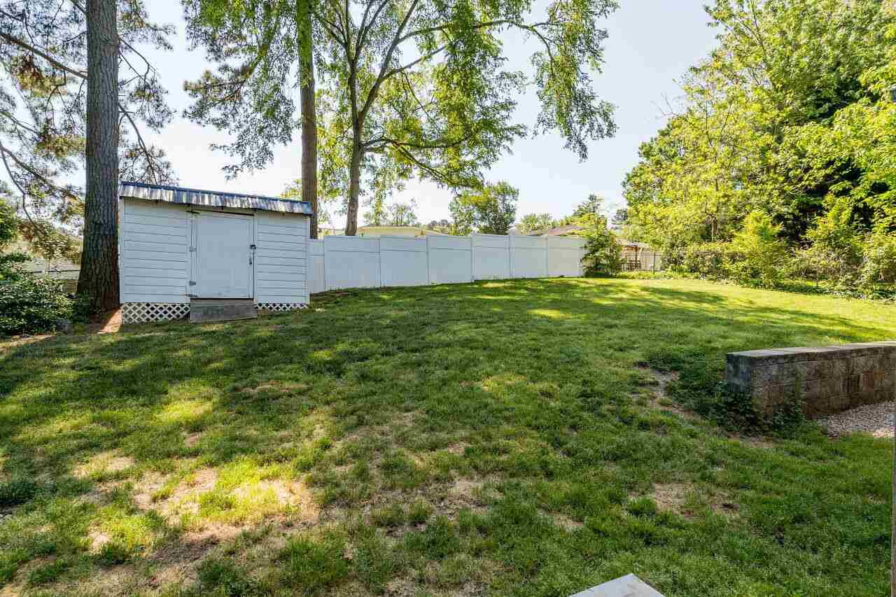 2125 Balboa Road Raleigh, NC 27603 - Photo 22 of 26 The detached storage building conveys with the sale of this home. Back Yard